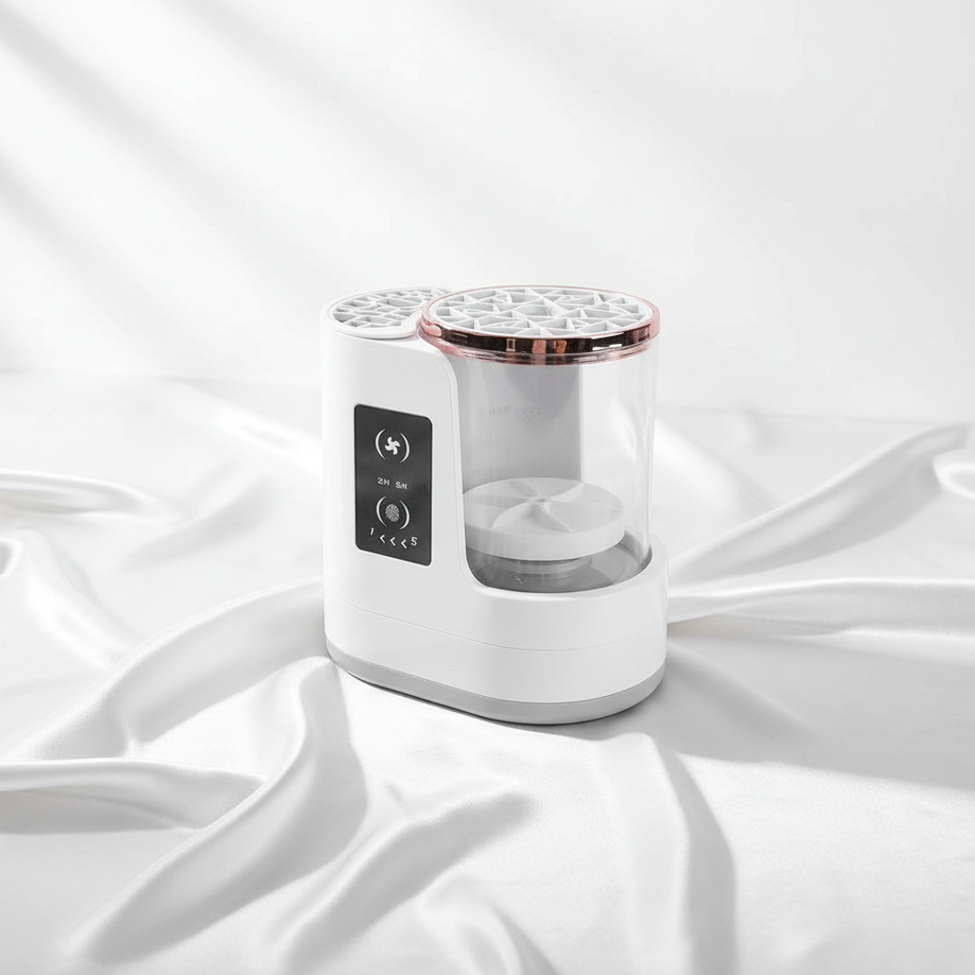 White and rose gold device on a white fabric background